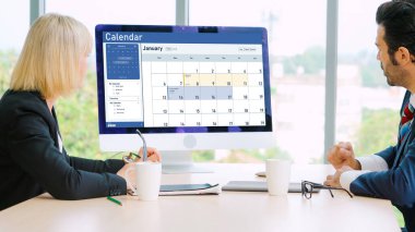 Calendar on computer software application for schedule planning for personal organizer and online business snugly