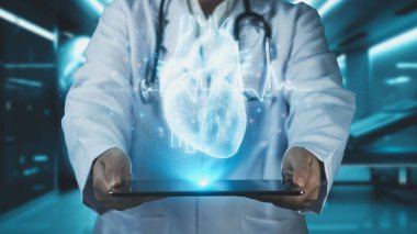 Tıbbi personelin laboratuvarda bulanık bir geçmişi olan kalp anatomisi hologramıyla tablet göndermesi. Yetenekli doktor kalp ameliyatına hazırlanıyor. Teknoloji. İyileştirici.