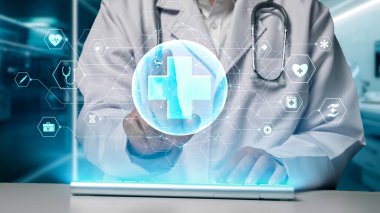 Zeki doktorların hastanede yüzen tıbbi çapraz hologramla klavyeyi gösterip daktilo etmelerine yakın durun. Tıp çalışanı tıbbi verileri araştırıyor ve analiz ediyor ya da sağlık sistemini birbirine bağlıyor. İyileştirici.