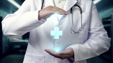 Doktorun tıbbi haç simgesini laboratuvarda yüzdürmesine yakın çekim. Teknoloji kullanarak tıbbi araştırmaların semptomlarını inceleyen profesyonel bir tıp çalışanı. Tıbbi tedavi. İyileştirici.