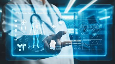 İnsan anatomisi hologramına bakan zeki doktorların laboratuvarda bulanık bir geçmişi var. Tıbbi araştırma yapan ve insan anatomisini inceleyen bir tıp çalışanı. Teknoloji. İyileştirici.