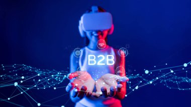 İş adamı B2B peyzajında geziniyor, iş-iş bağlantılarını geliştirmek için kullanım teknolojisi kullanıyor. B2B etkileşimlerini yeniden şekillendirir, iş stratejilerindeki yenilikleri tetikler. FaaS