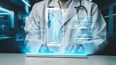 İnsan vücudunun anatomisi hologramıyla klavyede yazan zeki doktorlara yaklaş. Sağlık çalışanı, teknolojiyi kullanarak HUD gösterge paneline bakarken semptomları araştırıyor ve teşhis ediyor. İyileştirici.