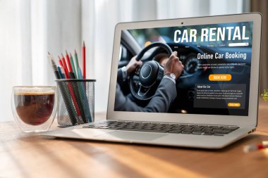 car rental website on computer screen for tourist to rent a car for transportation snugly