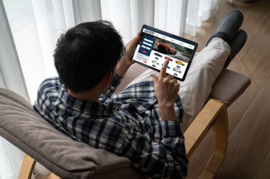 car rental website on computer screen for tourist to rent a car for transportation snugly