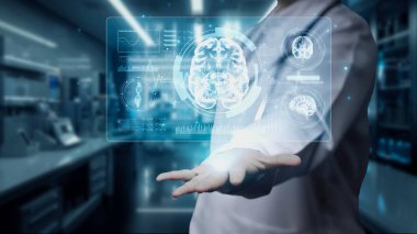 Laboratuvarda parlak mavi beyin hologramını tutan bulanık geçmişi olan doktorlara yaklaş. Yetenekli nörolog beyin hologramına ve beyin hasarına bakıyor. Eline odaklan. İyileştirici.