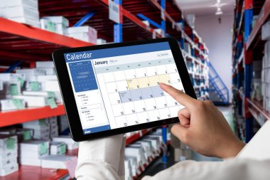 Calendar on computer software application for schedule planning for personal organizer and online business snugly