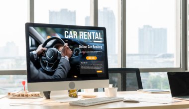 car rental website on computer screen for tourist to rent a car for transportation snugly