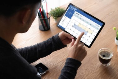 Calendar on computer software application for schedule planning for personal organizer and online business snugly