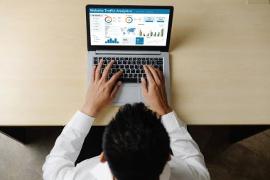 Computer software for website traffic analytics data on computer screen. Concept of SEO search engine optimization and customer targeting for online business snugly