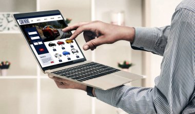 car rental website on computer screen for tourist to rent a car for transportation snugly