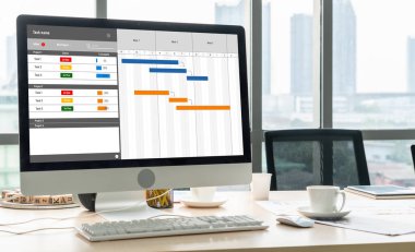 Ekip projesinin zaman çizelgesini gösteren bilgisayar ekranında, modern iş projesi yönetimi için proje planlama yazılımı
