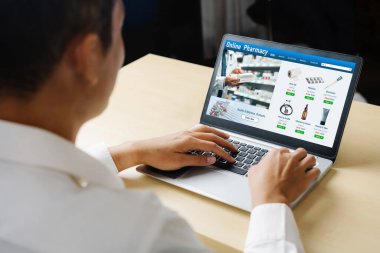 on pharmacy online store on computer screen for shopping for medical products drugs and medicine snugly