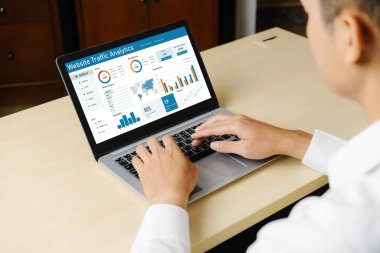Computer software for website traffic analytics data on computer screen. Concept of SEO search engine optimization and customer targeting for online business snugly