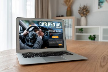 car rental website on computer screen for tourist to rent a car for transportation snugly