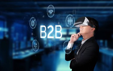 Bir iş adamı B2B işlemlerini geliştirmek için sanal gerçeklik teknolojisini araştırıyor, arz zincirindeki yenilikleri teşvik ediyor ve büyüme ve verimlilik için çevrimiçi ticaret yapıyor. XDMCP