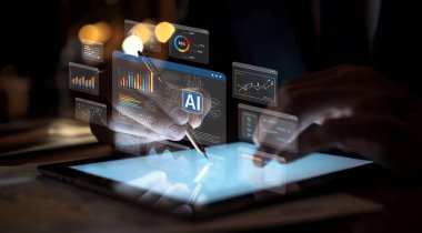 Yapay zeka araçlarıyla görsel veri temsilleri oluşturmak için tablet kullanan ellerin yakın çekimi, modern çalışma alanlarındaki teknoloji ve analizlerin füzyonunu vurguluyor. XDMCP