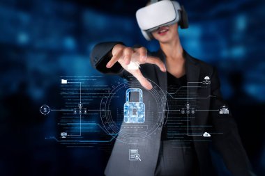 Profesyonel bir kadın sanal gerçeklik teknolojisiyle etkileşime geçerek siber güvenlik önlemlerini artırır, modern bir iş ortamında veri koruması ve mahremiyete odaklanır. XDMCP