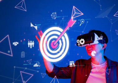 Sanal gerçeklikle pazarlama ve teknolojinin dinamik kesişimini keşfedin. Bu görüntü, gelişmiş iş sonuçları için hedef kitle stratejileri ile uğraşan bir kişiyi yakalar. XDMCP