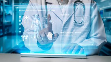 Laboratuvarda yüzen insan anatomisini araştıran ve işaret eden yetenekli doktorlara yaklaş. Tüm vücudu kontrol ederken klavye yazıp verileri analiz eden bir tıp çalışanı. İyileştirici.