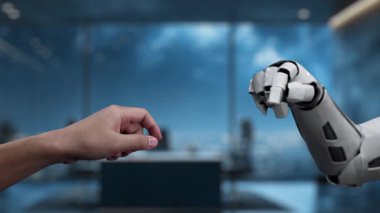 Bir insan eli, dijital bir hedefe odaklanarak, teknoloji ile iş amaçlarına ulaşma çabası arasındaki sinerjiyi temsil eden robotik bir ele doğru uzanır. Auvana