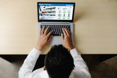 on pharmacy online store on computer screen for shopping for medical products drugs and medicine snugly