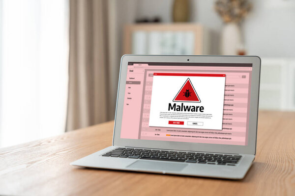 Cyber attacking concept. Malware alert showing on computer screen display scam and threat detection on computer system or online server to be removed snugly.