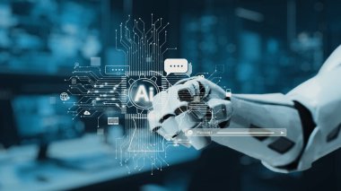 Fütüristik bir robot kolu yapay zeka teknolojisi arayüzü ile etkileşime geçerek, modern dijital çalışma alanı içinde veri görselleştirmeleri ve iletişim sembolleri sergiliyor. Auvana