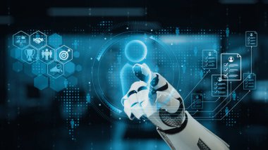 Robotik bir el holografik bir arayüzle etkileşime geçmek için uzanıyor, modern çalışma alanları ve kullanıcı katılımının geleceği üzerindeki teknolojik etkisini gösteriyor. Auvana