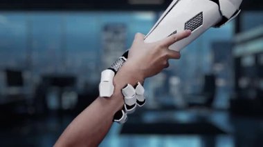 İnsan eliyle robot kol arasındaki etkileşimi gösteren çarpıcı bir video, modern işbirliğindeki güvenlik ve teknoloji rolünü vurguluyor. Auvana