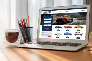 car rental website on computer screen for tourist to rent a car for transportation snugly