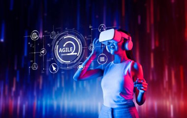 Neşeli bir kadın, canlı bir ortamda kulaklık kullanarak sanal gerçekliği tecrübe eder. Bu görüntü çevik yeniliğin ve dijital keşiflerin özünü yakalar. XDMCP