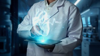 Close up of doctor holding tablet and pointing pen with heart hologram floating at laboratory with blurring background. Medical worker checking symptom and preparing for heart surgery. Tech. Remedial. clipart