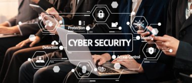 Asyalı iş başvurusu için başvuran kişi iş görüşmesi için bekleme odasında oturuyor. Ofis çalışanı ya da iş adamları dizüstü bilgisayar ve telefon kullanarak sıkışık bir odada birlikte çalışıyorlar. Alevli Dostluk