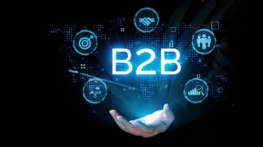 İş adamı B2B peyzajında geziniyor, iş-iş bağlantılarını geliştirmek için kullanım teknolojisi kullanıyor. B2B etkileşimini yeniden şekillendiren keşifler, iş-iş stratejilerinde yenilikleri yönlendiren araçlar. Kullanıcı Kimliği