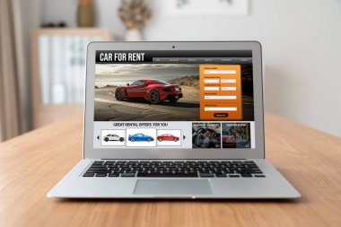 car rental website on computer screen for tourist to rent a car for transportation snugly
