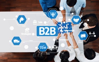 Çeşitli takım üyeleri, ortak ortaklığı, satış stratejilerini ve karşılıklı büyümenin e-ticaret gelişimini sembolize etmek için bir B2B anlaşması üzerinde işbirliği yapmaktadır. Dostluk