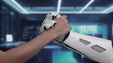 Bu video, ofis ortamında insan ve robot eller arasındaki bir ortaklığı gösteriyor, yeniliği ve başarıyı dijital bir ödül ile sembolize ediyor. Auvana