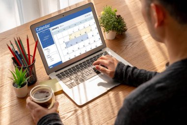 Calendar on computer software application for schedule planning for personal organizer and online business snugly