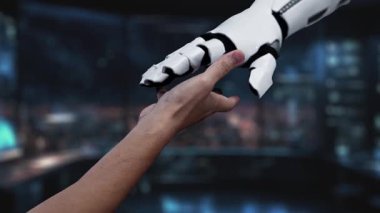 Bir el, modern ofis ortamında bilgi arayışını simgeleyen çeşitli eğitim sembolleriyle çevrili bir mezuniyet şapkası ikonuna uzanıyor. Auvana