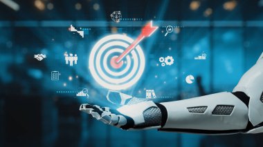 Bir robot el, modern bir iş ortamında yenilik ve stratejik hedefleri sembolize ederek, veriler ve simgelerle çevrili dijital bir hedefe doğru uzanır. Auvana