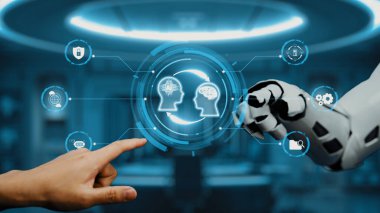 İnsan eli robot ele doğru uzanıyor, insanlarla teknoloji arasındaki etkileşimi sembolize ediyor, iletişim, öğrenme ve ilerleme temalarını vurguluyor. Auvana
