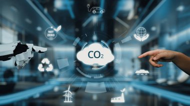 Bu dinamik görüntü, karbondioksit emisyonlarını yönetme ve azaltma yöntemlerini göstererek yenilikçi teknoloji ve sürdürülebilirlik temalarını vurgular. Auvana