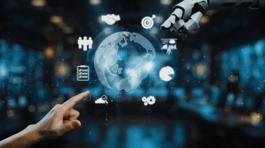 Görsel veri simgeleri ve grafiklerle çevrili, teknolojideki gelişmeleri sembolize eden, bir insan eli ve bir robotik elin yer aldığı çekici bir sahne. Auvana