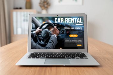 car rental website on computer screen for tourist to rent a car for transportation snugly