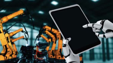 Cybernated industry robot and robotic arms for assembly in factory production . Concept of artificial intelligence for industrial revolution and automation manufacturing process .