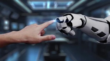 Bir insan eli robotik bir ele uzanıyor, her ikisi de insanlar ve teknoloji arasındaki işbirliğini sembolize eden yüksek teknolojili bir laboratuvarda dijital bir devre kartı ile meşgul. Auvana