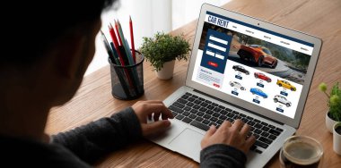 car rental website on computer screen for tourist to rent a car for transportation snugly