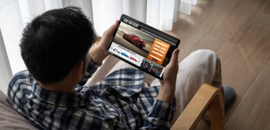 car rental website on computer screen for tourist to rent a car for transportation snugly