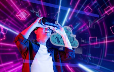 Sanal gerçeklik gözlüğü takan bir adam, canlı dijital grafikler arasında bulut bilişim ve modern teknolojinin kesişiminin altını çizerek derin bir deneyim yaşıyor. XDMCP